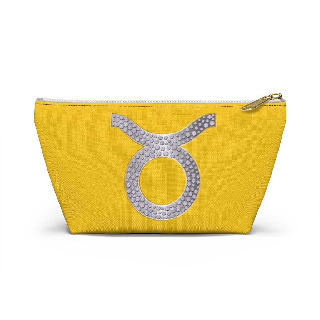 Yellow clutch bag with silver and rhinestone taurus zodiac sign symbol, gold top zipper. black inner lining. strapless handbag for taurus zodiac sign women, travel pouch great git for taurus birthday
